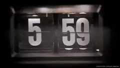 Tom Hanks hits flip clock alarm