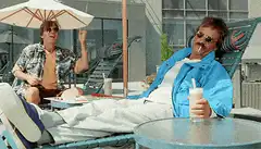 Dale and Jimbo relaxing by the pool