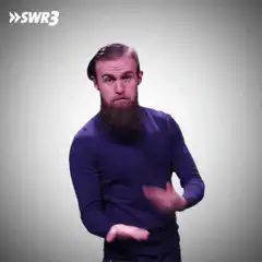 Bearded man shrugging with hands