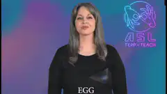 Woman signing the ASL word EGG