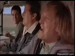 Three men screaming in a car