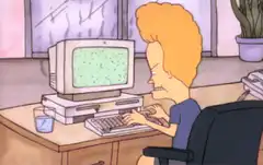 Beavis and Butt-Head spills drink on computer