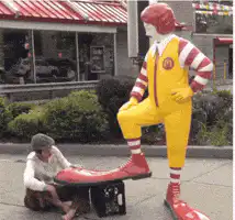 Ronald McDonald statue leg being painted