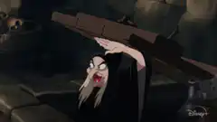 Madame Medusa hits Vinnie with a plank