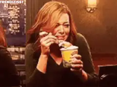 Woman eating ice cream with a disgusted face