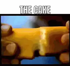 Hands pulling apart yellow cake