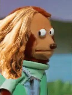 Dog puppet with blonde wig