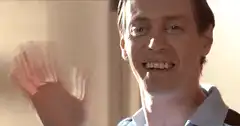 Steve Buscemi waving and smiling