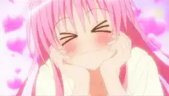Pink-haired anime girl blushing with hearts