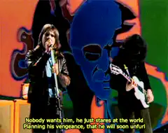 Singer singing with blue face background