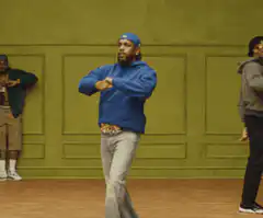 Man in blue hoodie dancing