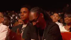 Snoop Dogg laughing in audience