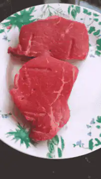 Markiplier with raw steaks