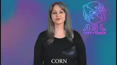 Woman signing corn in ASL
