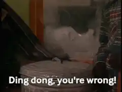 Oscar the Grouch pops out of trash can