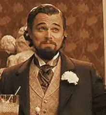 Leonardo DiCaprio as Jay Gatsby looking skeptical