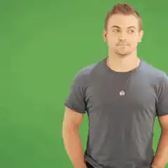 Man looks away on green screen