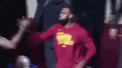 LeBron James high-fiving teammates