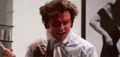 Man in white shirt laughing hysterically