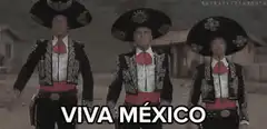 Three Mariachi Men Say Viva Mexico