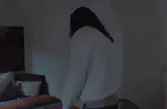 woman falls onto bed