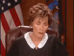 Judge Judy looks to the side