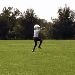 person with bowling ball head dancing