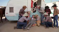 Cowboys throw hats in the air