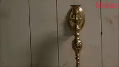 Hand turning a brass door knob