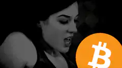 Woman screaming at Bitcoin logo