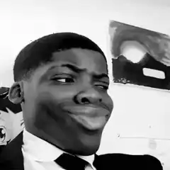 Man in suit making funny faces