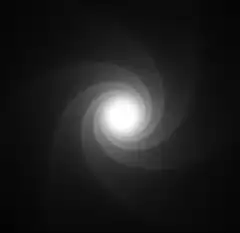 white spiral on black background