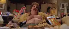 Fat man eating junk food