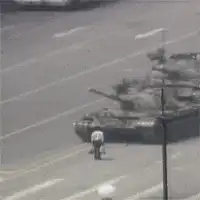 Tank Man stands in front of tanks