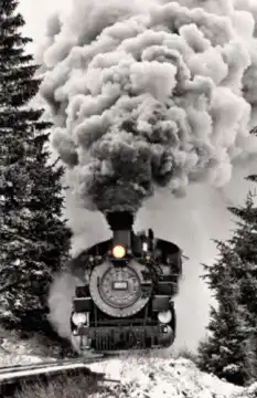 steam train billowing smoke