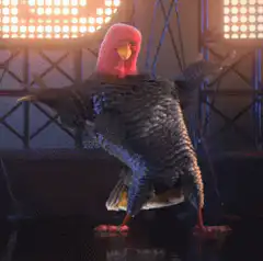 Red bird puppet dancing on stage