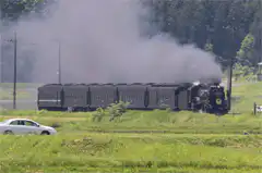 steam train passing through countryside