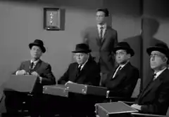Men in suits with briefcases