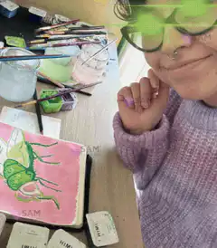 Girl with glowing green lightsaber glasses