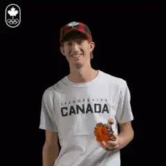 Man in Canada shirt drinks maple syrup