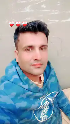 Man in blue hoodie with heart emojis