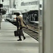 Man running on train platform