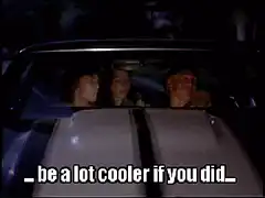 Three guys in a car laughing