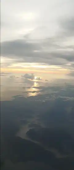 aerial view of sunset over ocean and islands