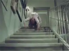 The Grady Girl Crawling Down the Stairs