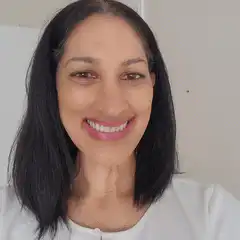Woman smiling and closing mouth