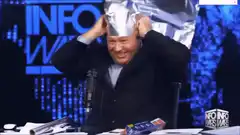Alex Jones puts on tinfoil hat