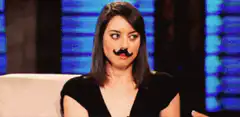 Olivia Munn with a mustache