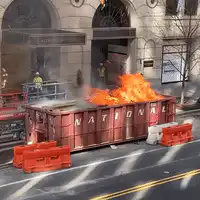 Firefighters extinguishing dumpster fire