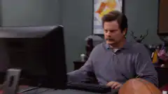 Ron Swanson throws computer in dumpster